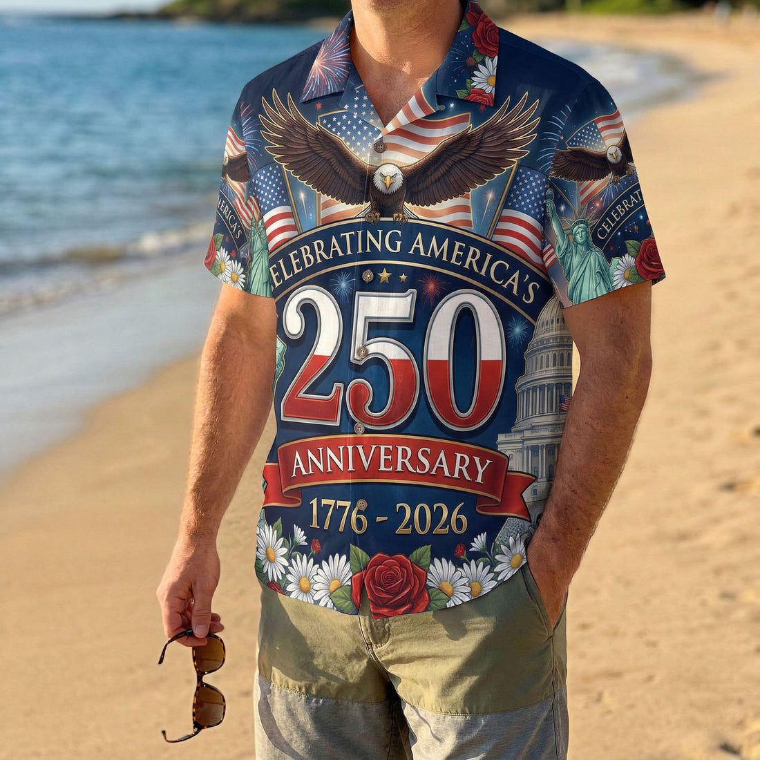 Front view of a navy blue patriotic Hawaiian shirt celebrating the US 250th anniversary with Statue of Liberty, Capitol building, and bald eagle.