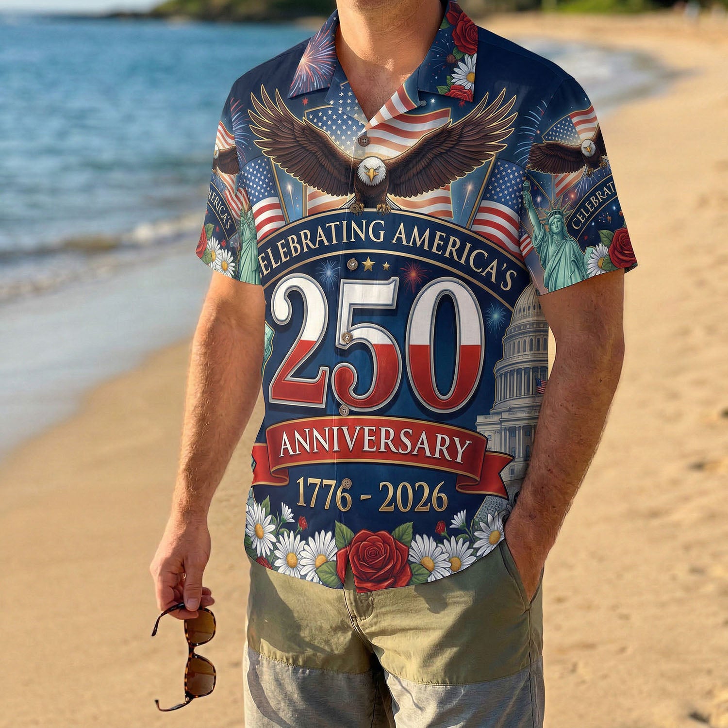 A man wearing the vibrant 250th anniversary celebratory shirt on a beach, highlighting a festive and proud American summer look.
