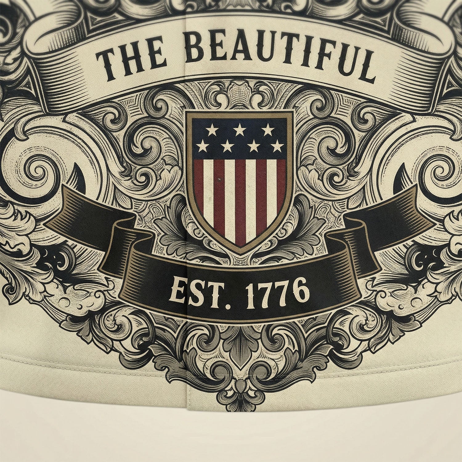 Macro close up of the patriotic shield icon and Est 1776 banner on the vintage cream Liberty Bell Hawaiian shirt