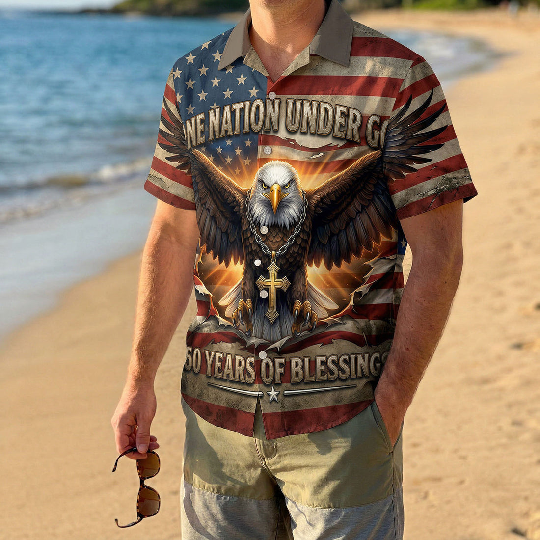 Front view of a patriotic Hawaiian shirt with a bald eagle, American flag background, and "One Nation Under God" text.