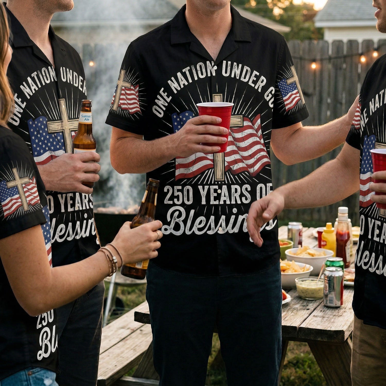A group of people wearing matching 250 Years of Blessings Hawaiian shirts at an outdoor backyard BBQ party.