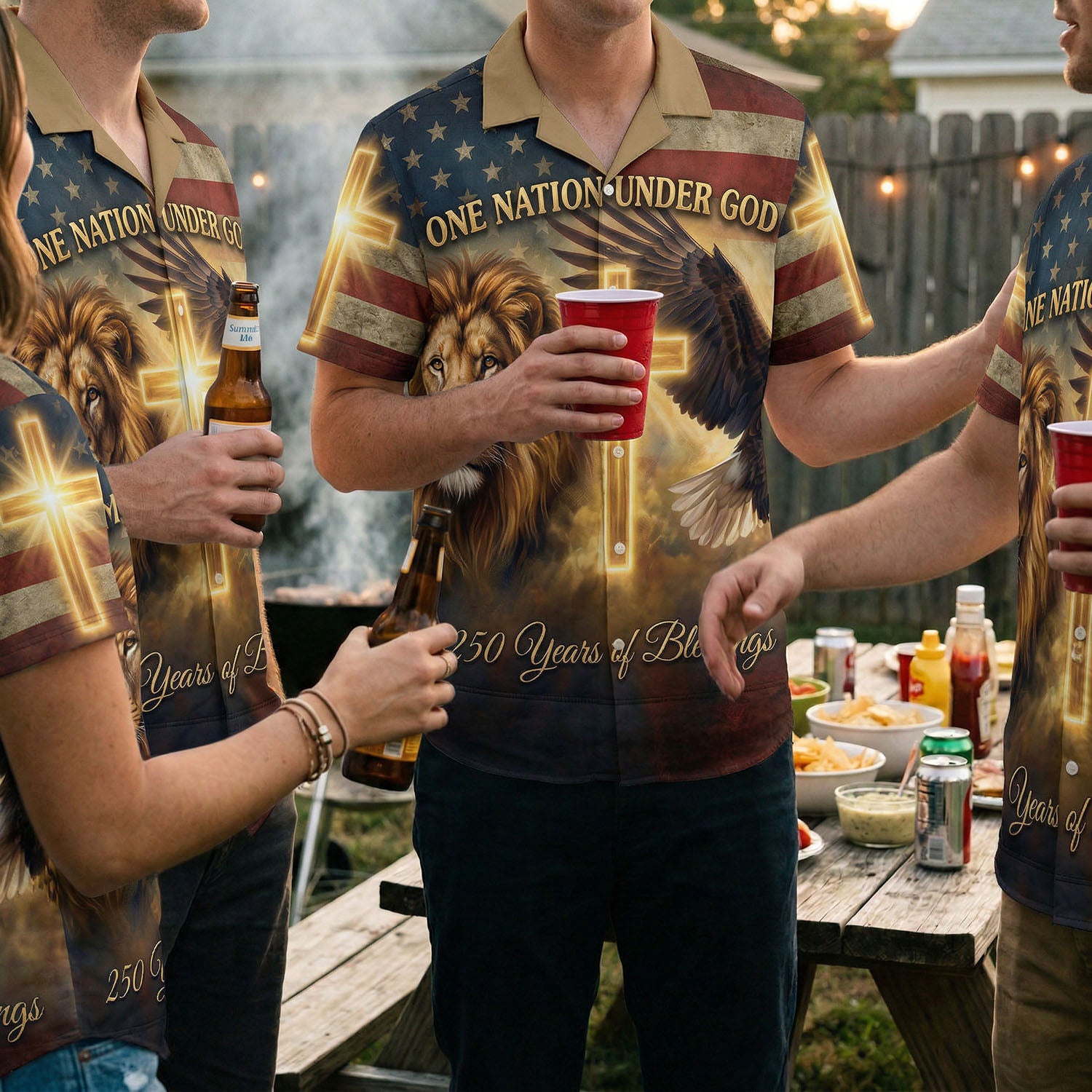 A group of people wearing matching 250 Years of Blessings lion and eagle Hawaiian shirts at an outdoor backyard BBQ celebration.