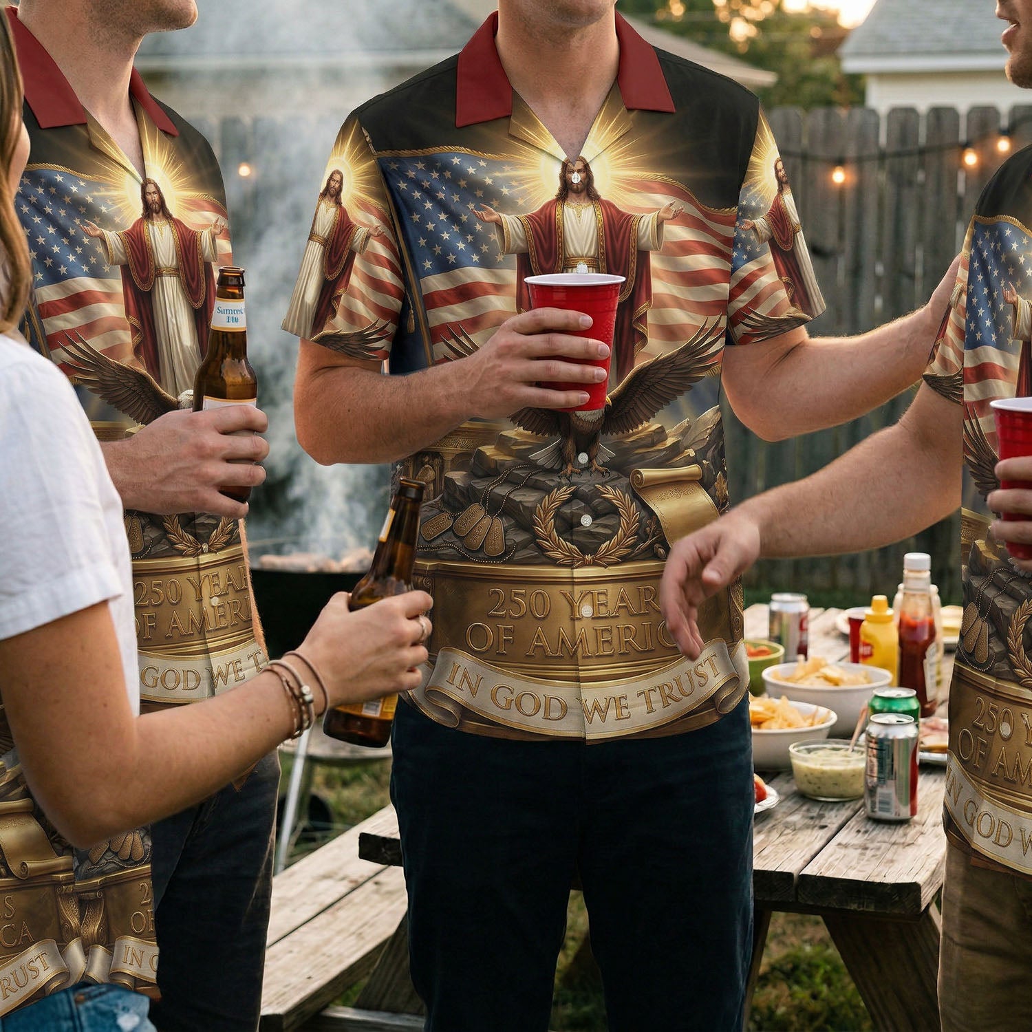 A group of people wearing matching 250 Years of Freedom Hawaiian Heritage shirts at an outdoor backyard BBQ celebration.
