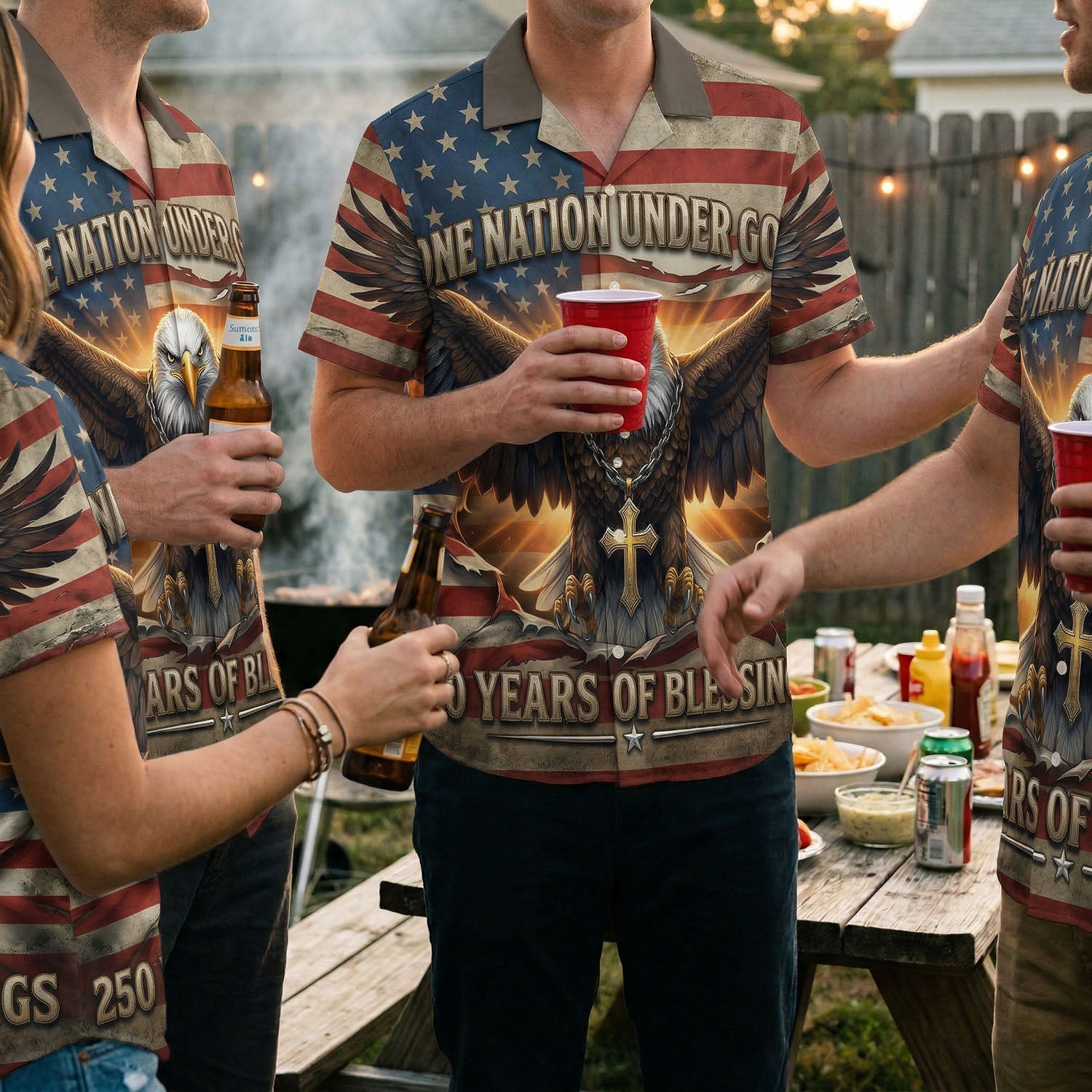 Lifestyle photography of patriots at a BBQ party wearing the One Nation Under God shirt, showcasing pride and community spirit.