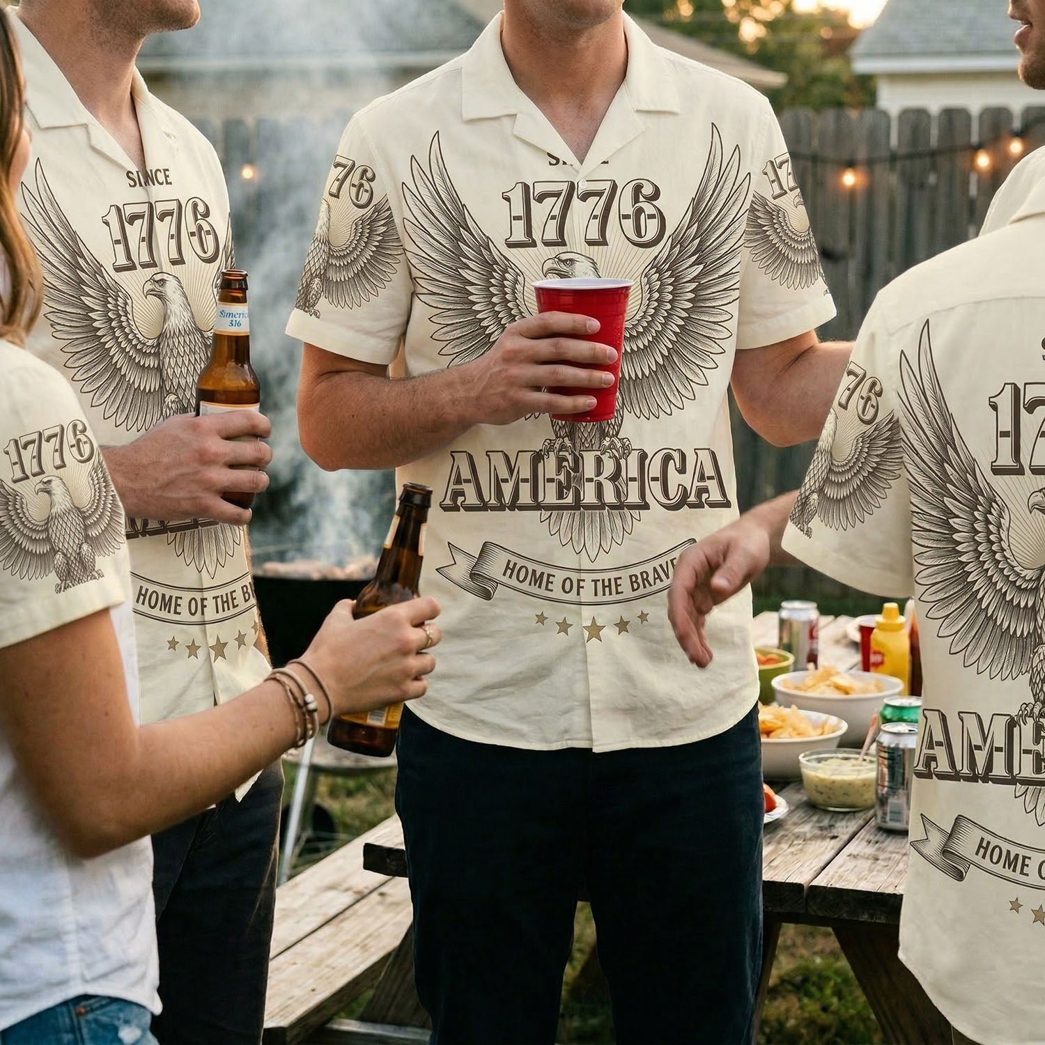 Lifestyle photography of men at a BBQ party wearing the 1776 vintage patriotic shirt, emphasizing social and celebratory use.