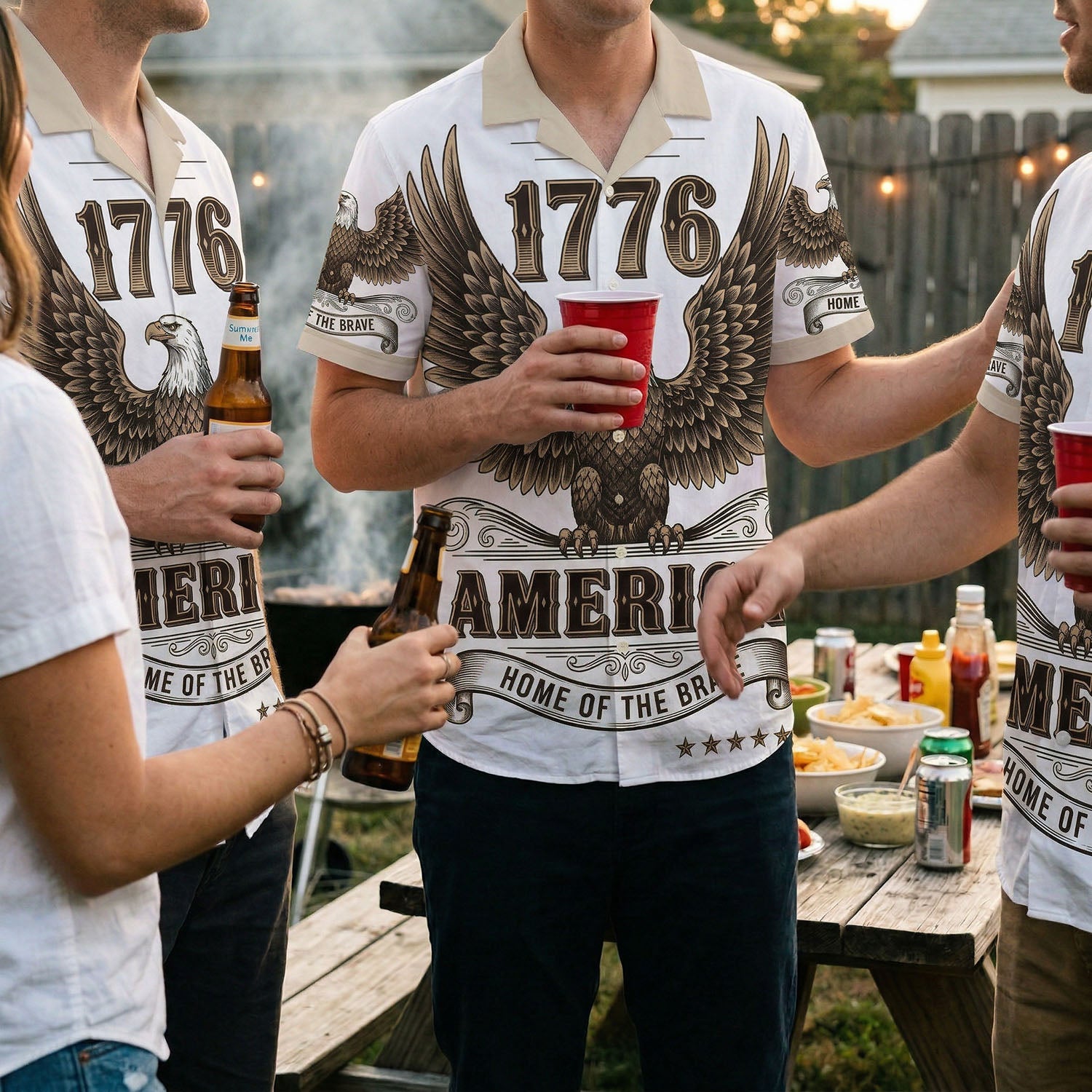 A group of friends wearing matching 1776 America eagle shirts at a backyard BBQ representing the festive American spirit