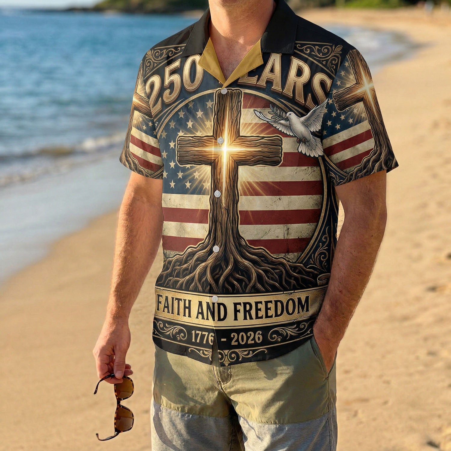A male model wearing the black Faith and Freedom patriotic Aloha shirt on a sunny beach, showcasing a meaningful and stylish American summer look.