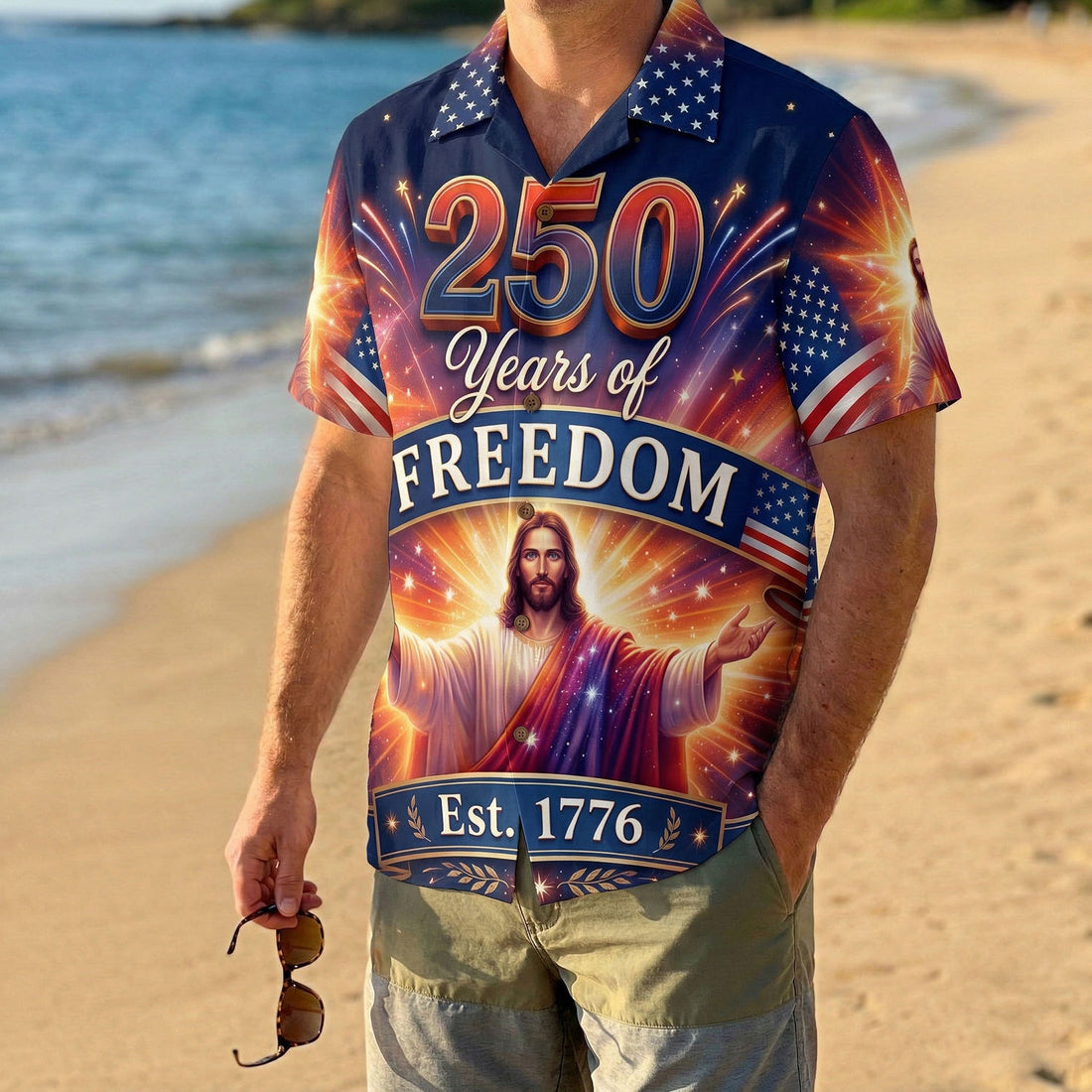 Front view of a navy blue patriotic Hawaiian shirt featuring Jesus Christ, fireworks, and "250 Years of Freedom" text for the US 250th anniversary.