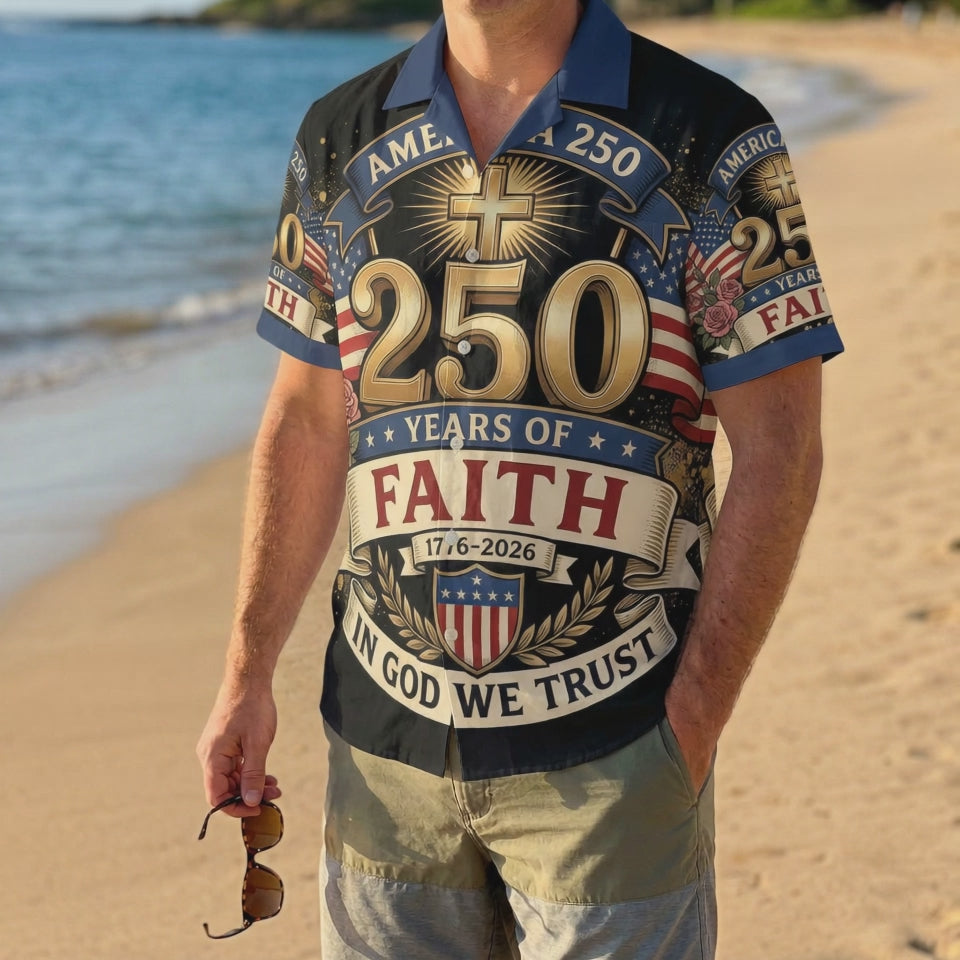 A male model wearing the vintage One Nation Under God Aloha shirt on a sunny beach, showcasing a meaningful and patriotic summer look.