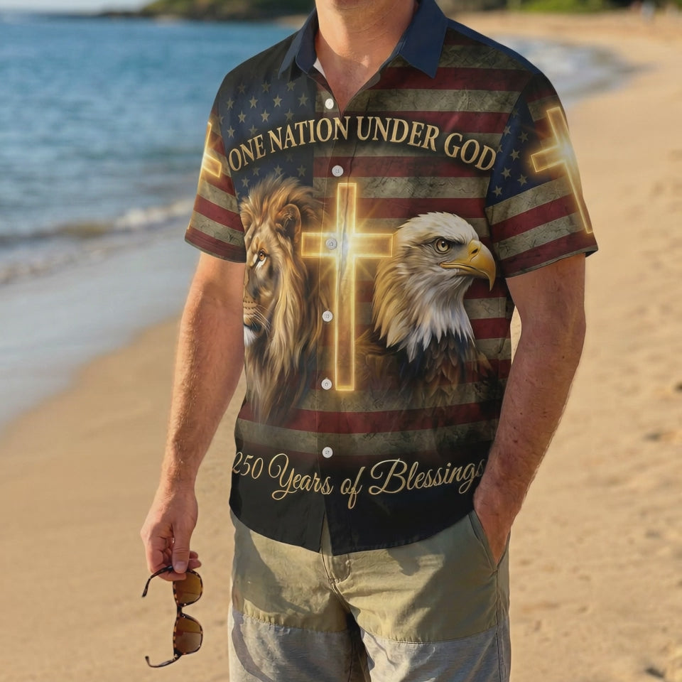 A man enjoying a summer day at the beach wearing the vintage-inspired One Nation Under God Aloha shirt, perfect for July 4th vacations.