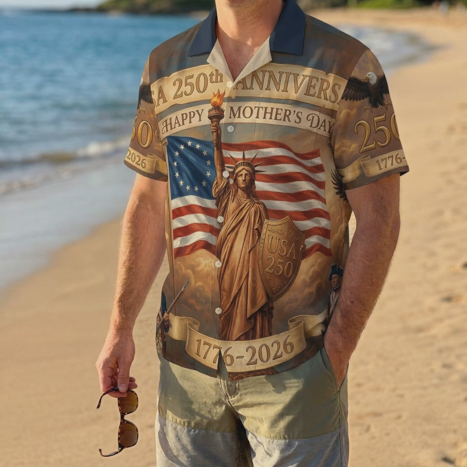 A male model wearing the vintage One Nation Under God Aloha shirt on a sunny beach, showcasing a meaningful and patriotic summer look.