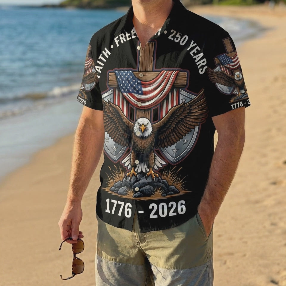 A male model wearing the black American Eagle patriotic Aloha shirt on a sunny beach, showcasing a cool and bold summer style.